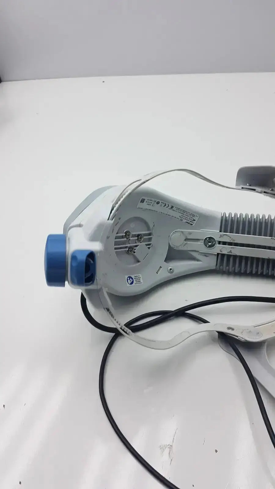 White and blue electric hair dryer with ribbed grip handle for stryker flyte helmet ref 0408-600-000 use