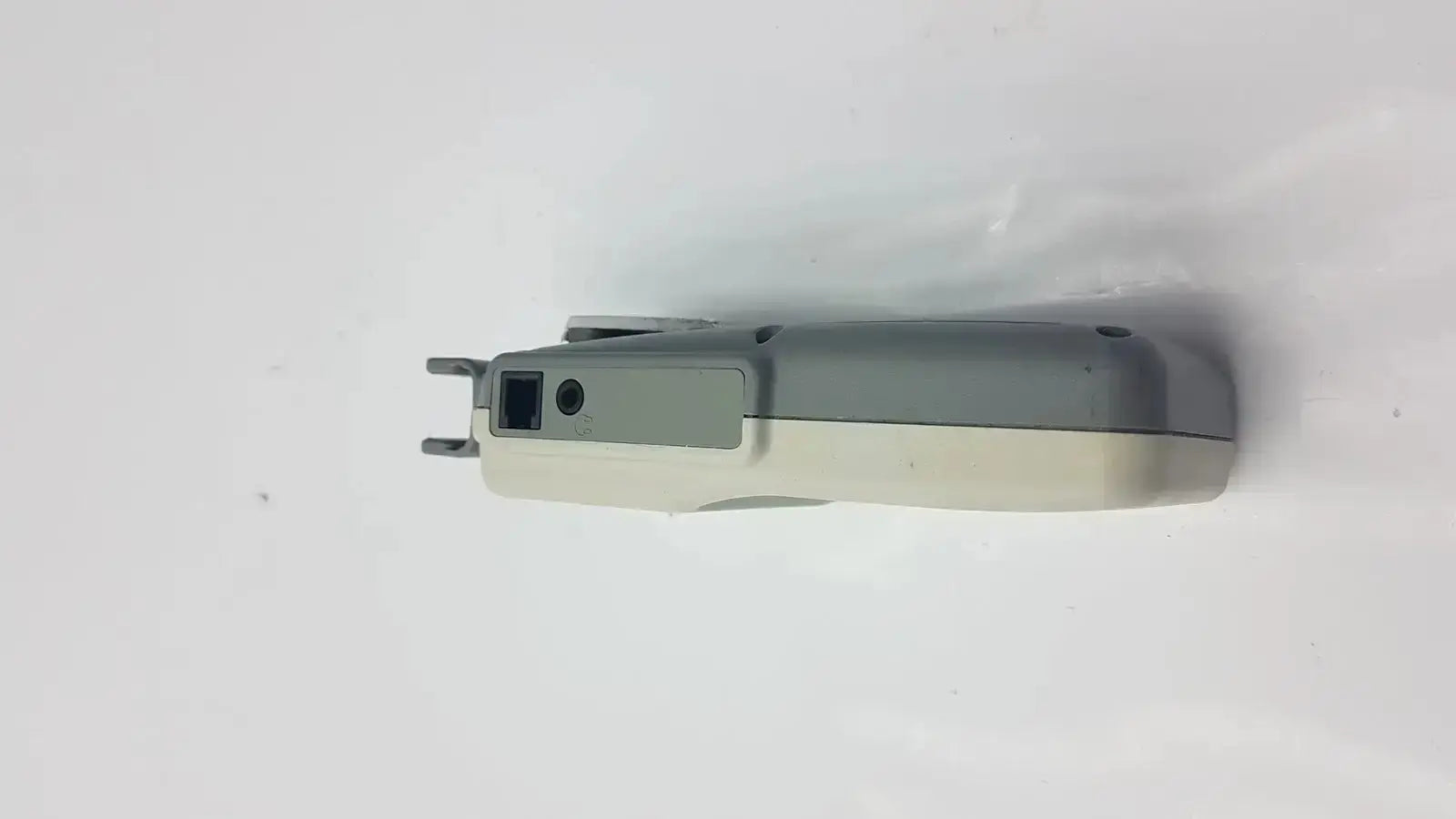 Gray and white lifedop l250ar handheld doppler with rectangular screen, 2 mhz probe, and metal prongs for fetal monitoring