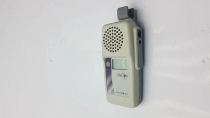 Beige lifedop l250ar handheld doppler with 2 mhz probe, speaker grille, and purple branding for portable use