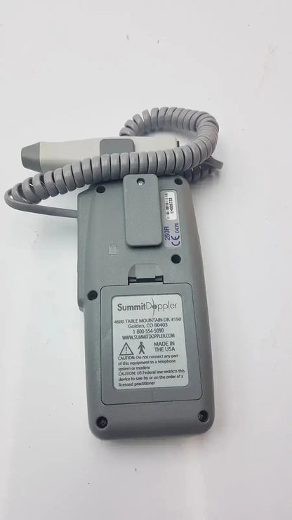 Gray summiit doppler lifedop l250ar device with coiled gray cable and white 2 mhz probe attached