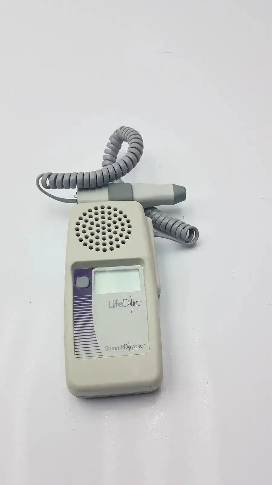 Beige handheld lifedop l250ar semmi doppler with gray coiled cord and 2 mhz probe transducer for medical use