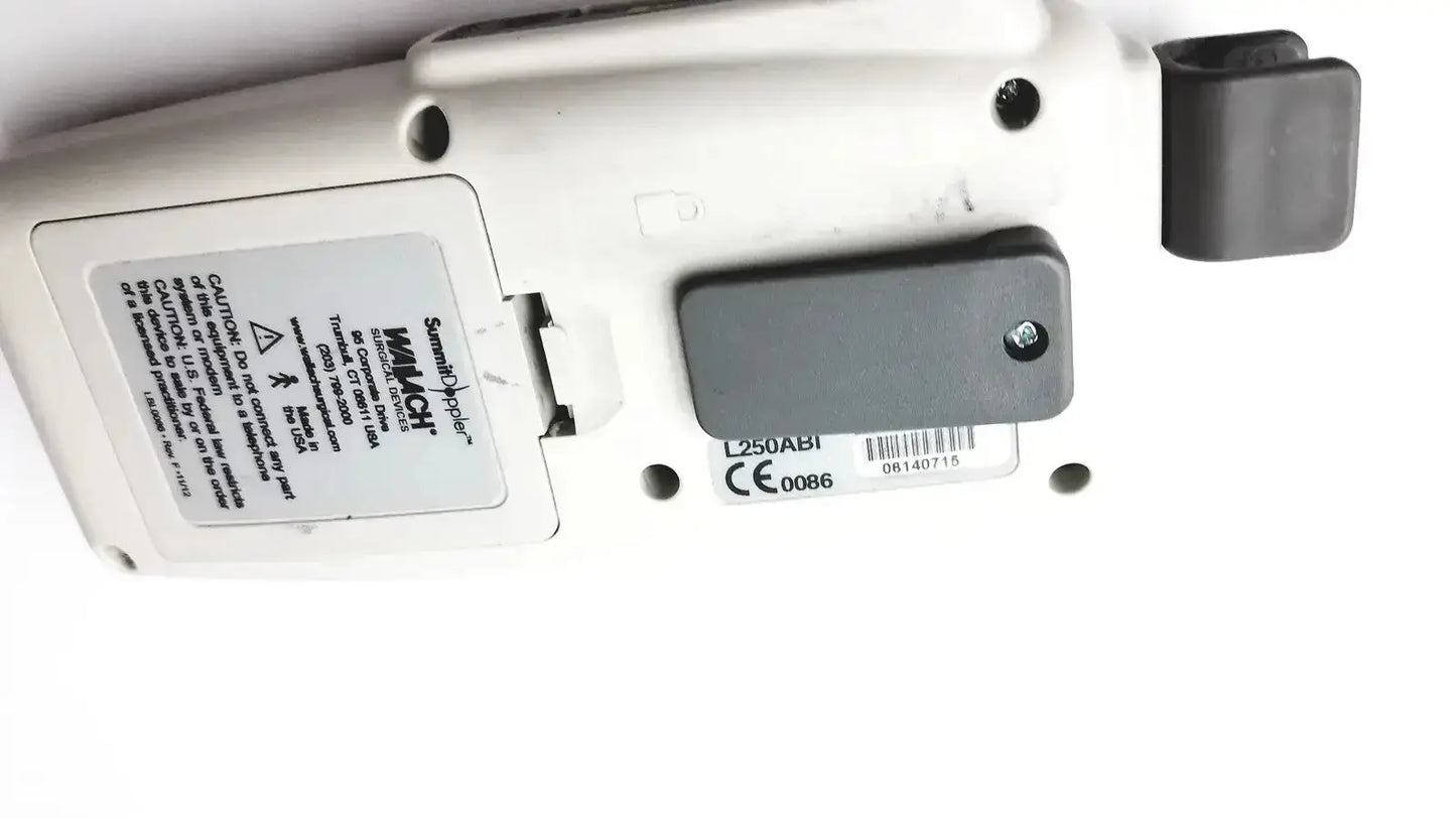 White plastic summiit liifedop abi l250 device with black rectangular component and label stickers for vascular system use