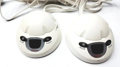 Two white sunbeam foot warmers with black control buttons and digital display for l78-dd2d style 85kqp blanket controller