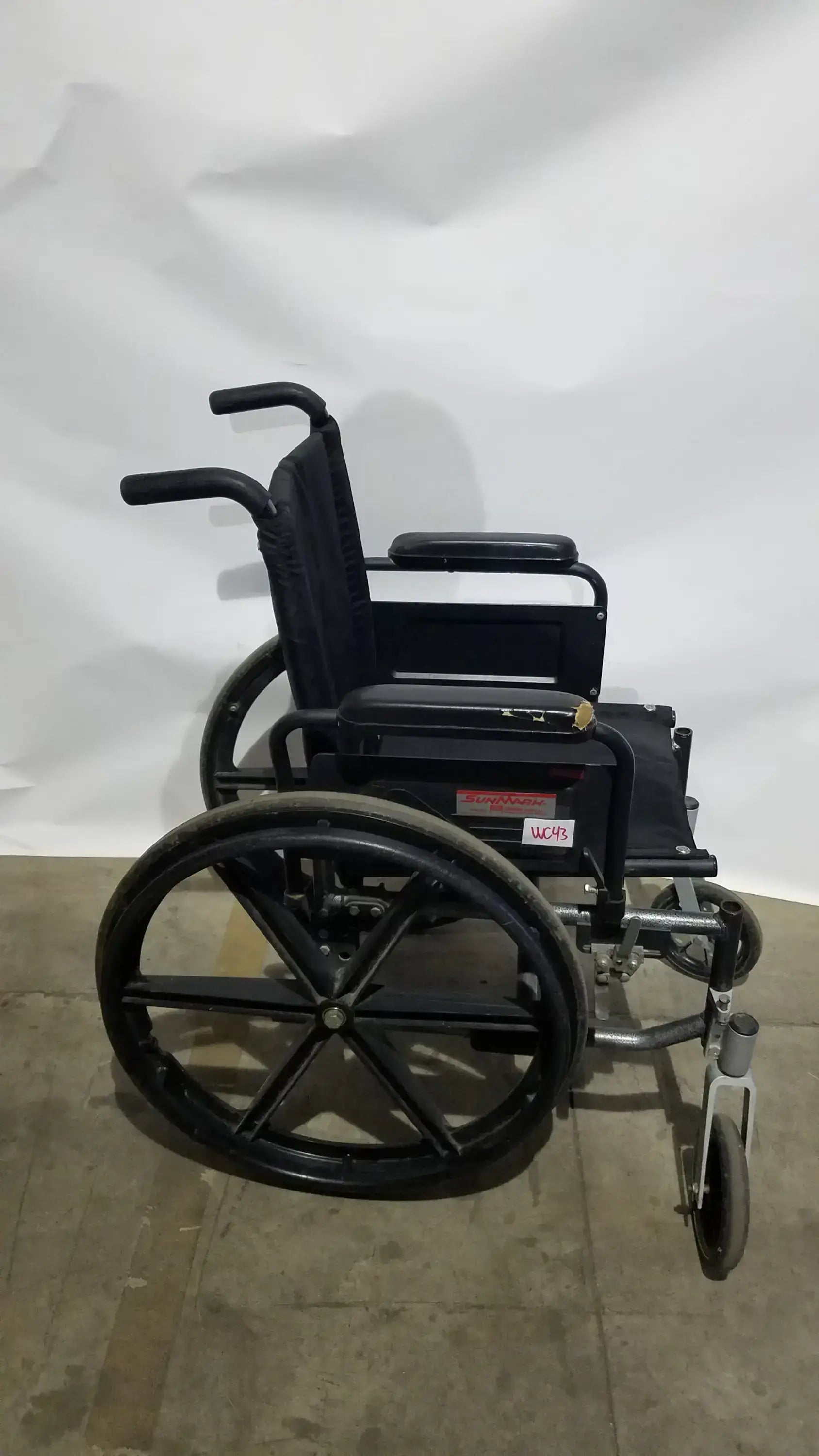 Sunmark Folding Manual Wheelchair - Durable Black Padded Comfort Seat
