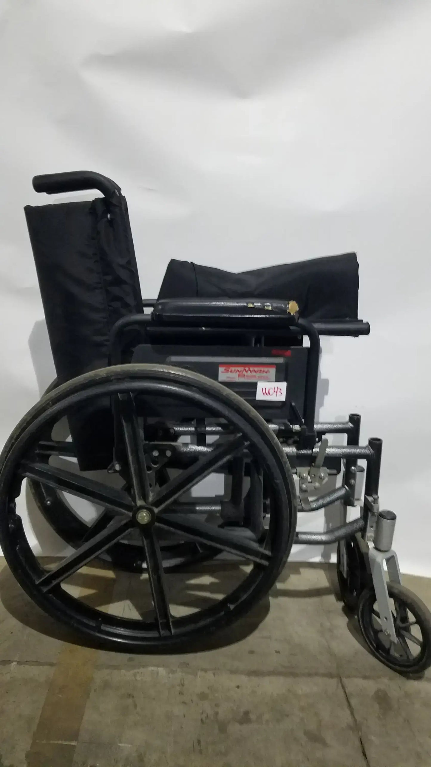 Sunmark Folding Manual Wheelchair - Durable Black Padded Comfort Seat