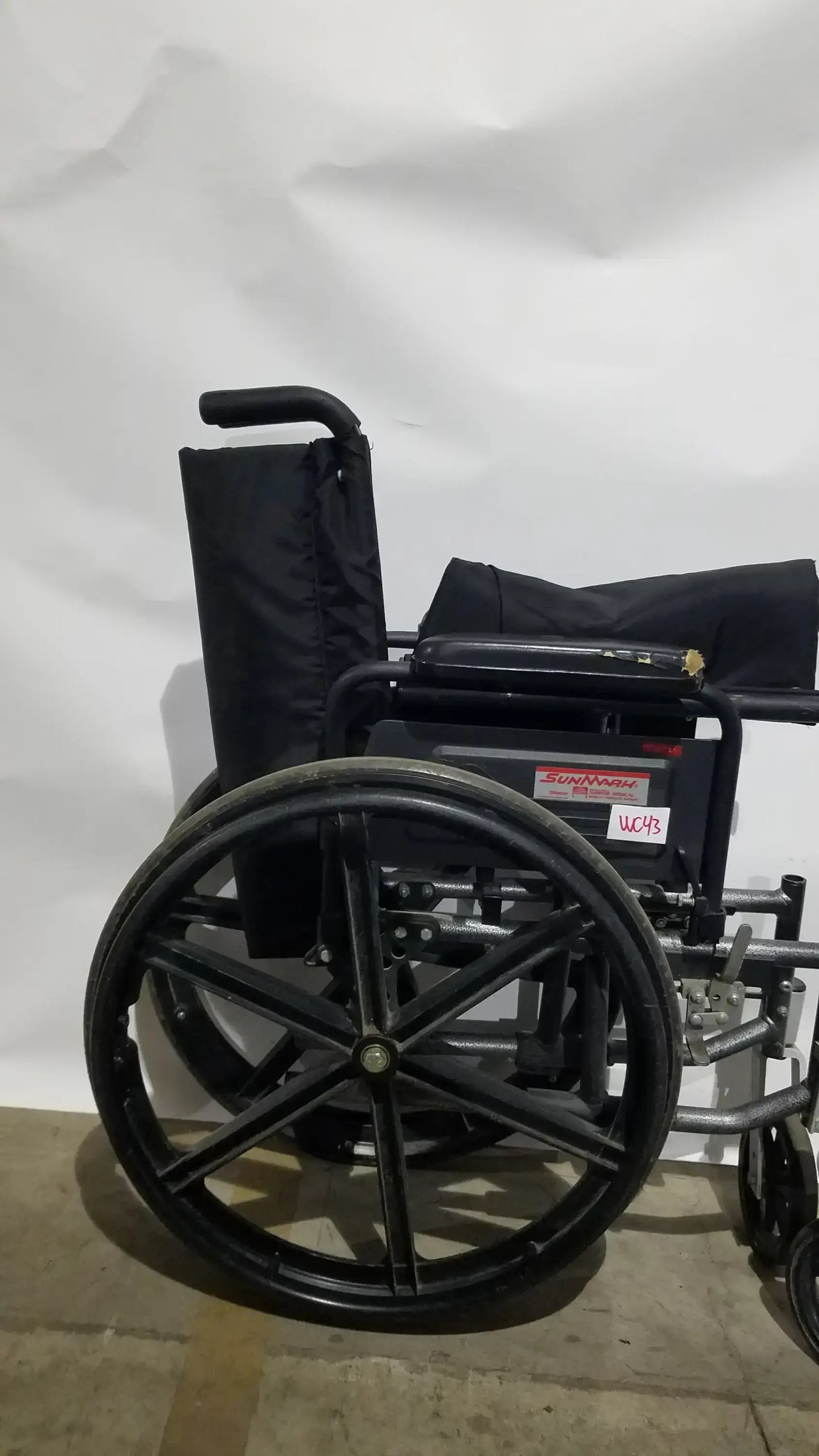 Sunmark Folding Manual Wheelchair - Durable Black Padded Comfort Seat