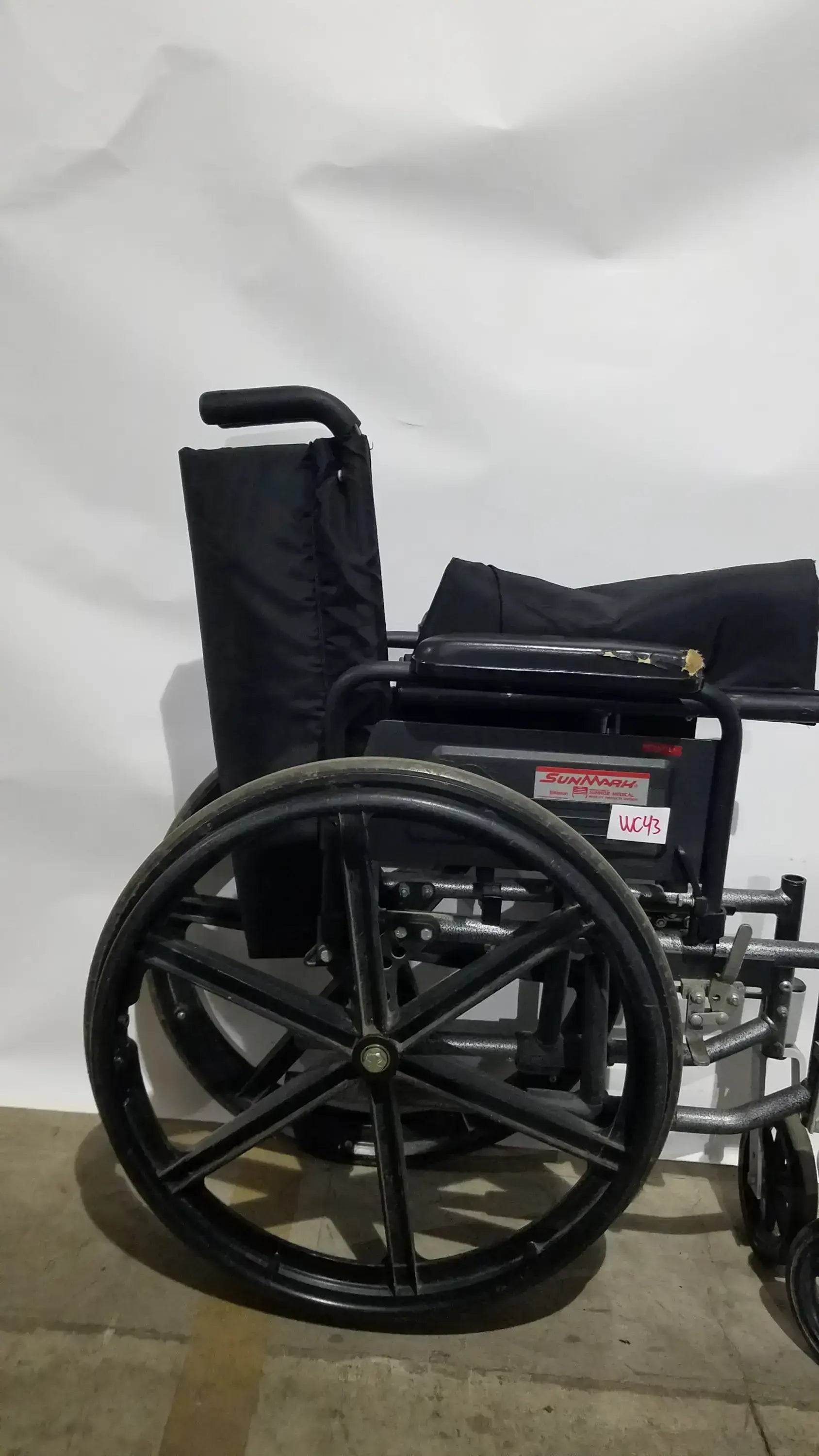Sunmark Folding Manual Wheelchair - Durable Black Padded Comfort Seat