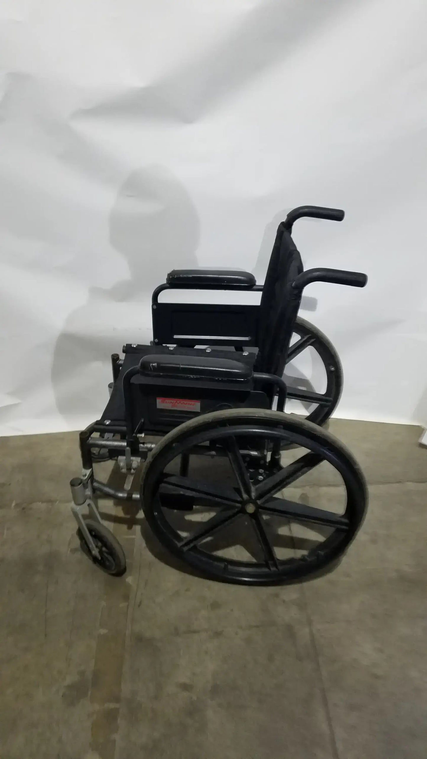 Sunmark Folding Manual Wheelchair - Durable Black Padded Comfort Seat