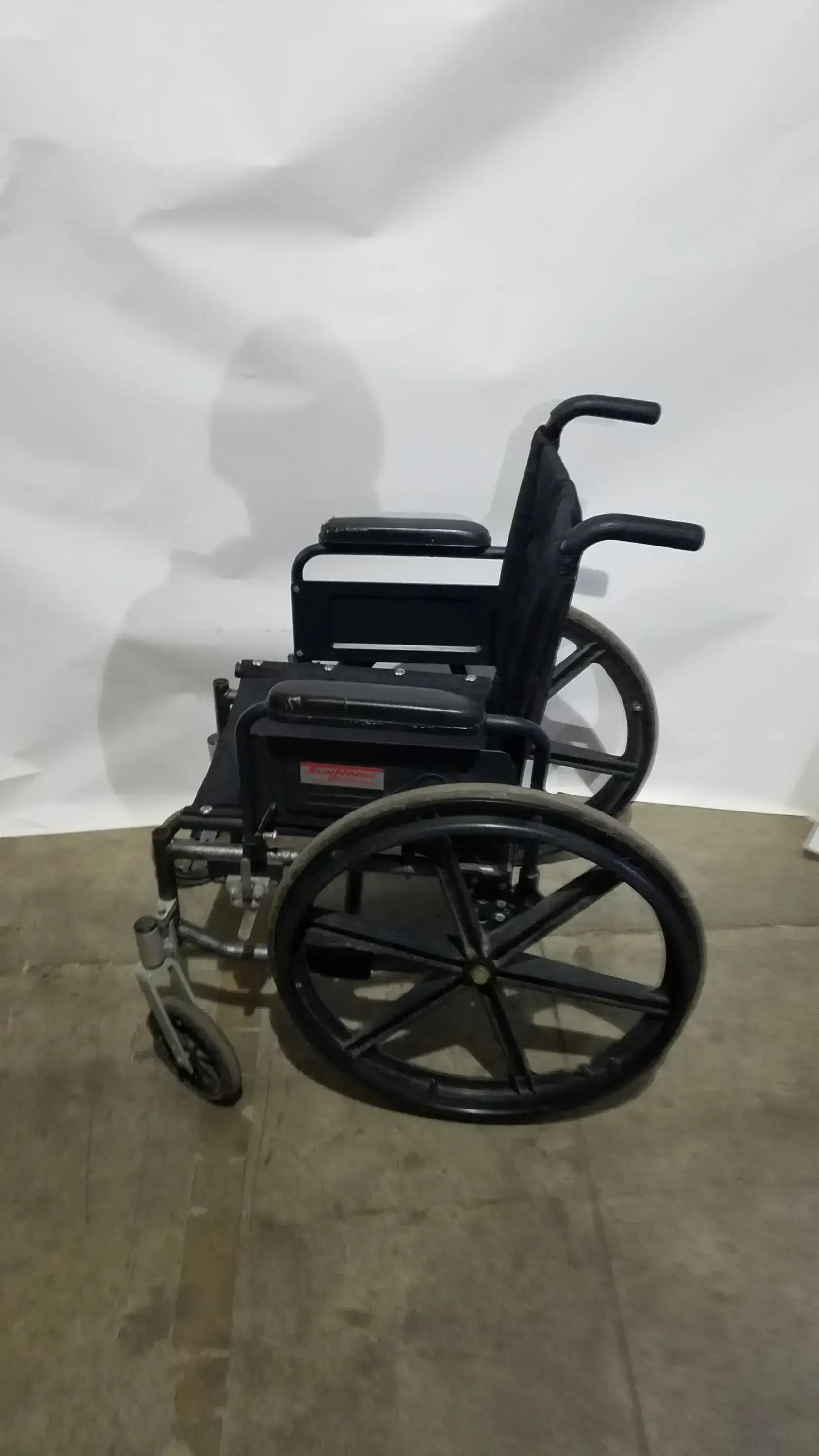 Sunmark Folding Manual Wheelchair - Durable Black Padded Comfort Seat
