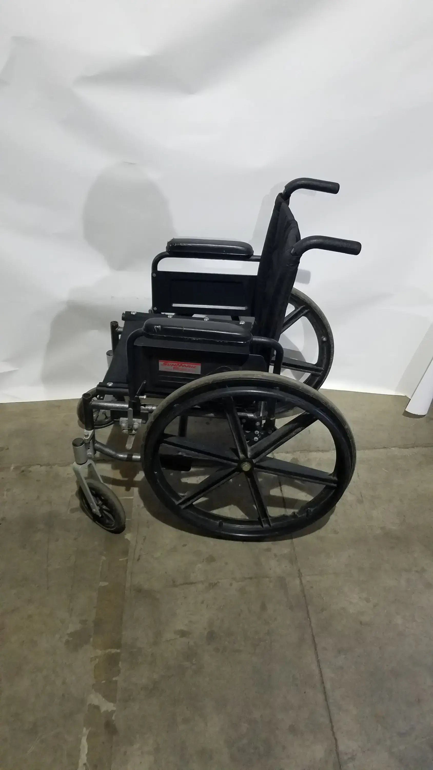 Sunmark Folding Manual Wheelchair - Durable Black Padded Comfort Seat