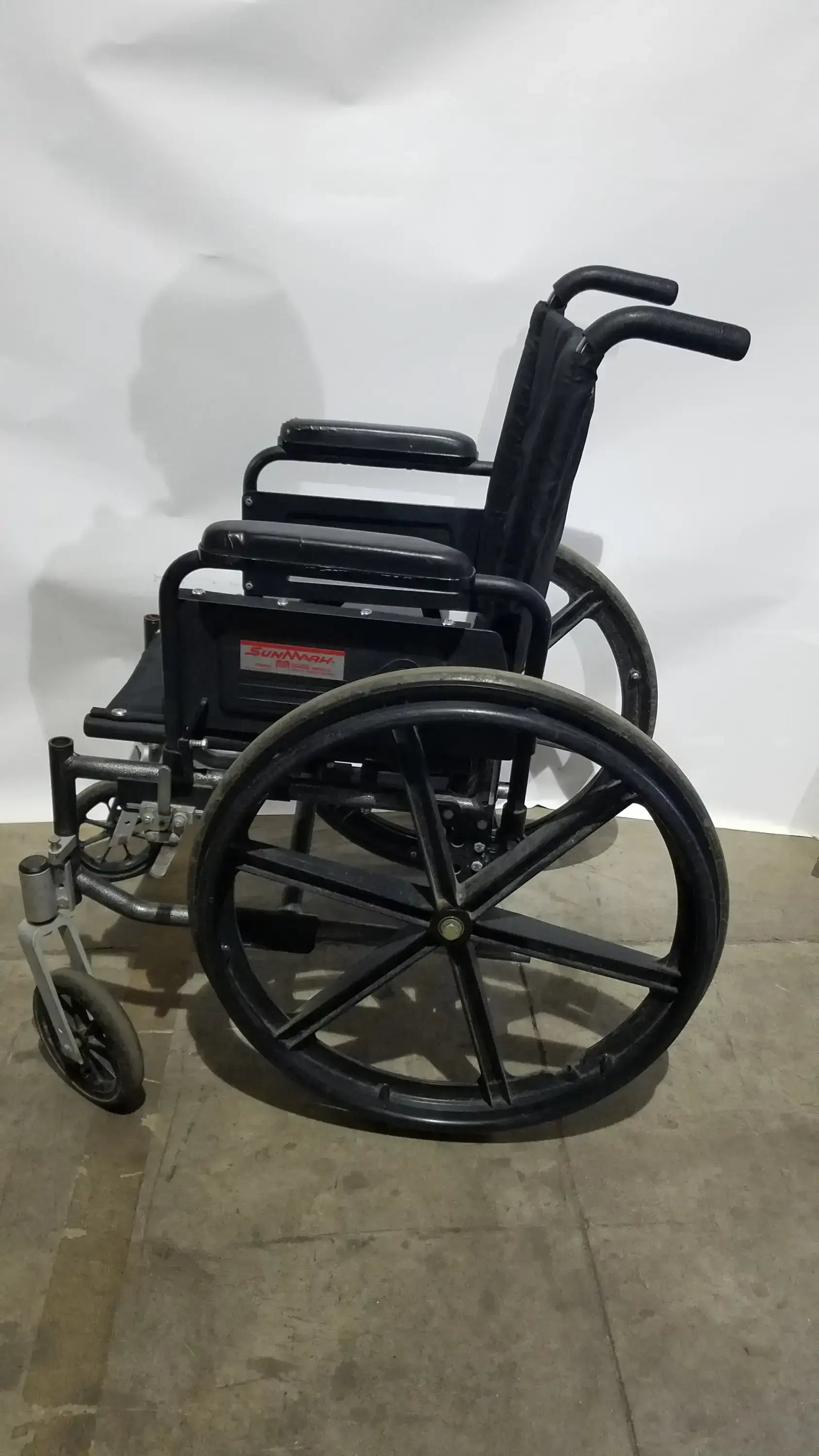 Sunmark Folding Manual Wheelchair - Durable Black Padded Comfort Seat
