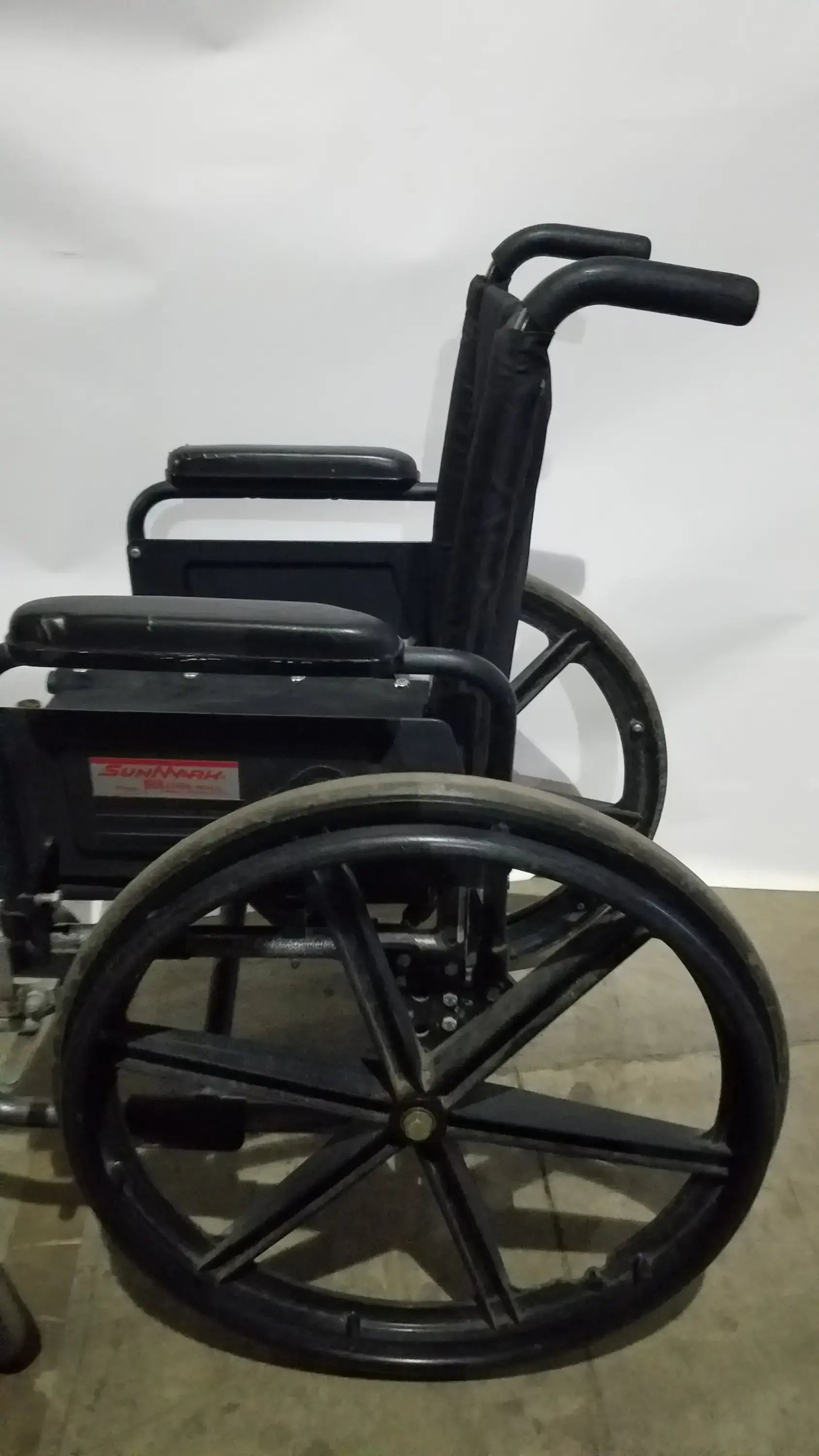 Sunmark Folding Manual Wheelchair - Durable Black Padded Comfort Seat