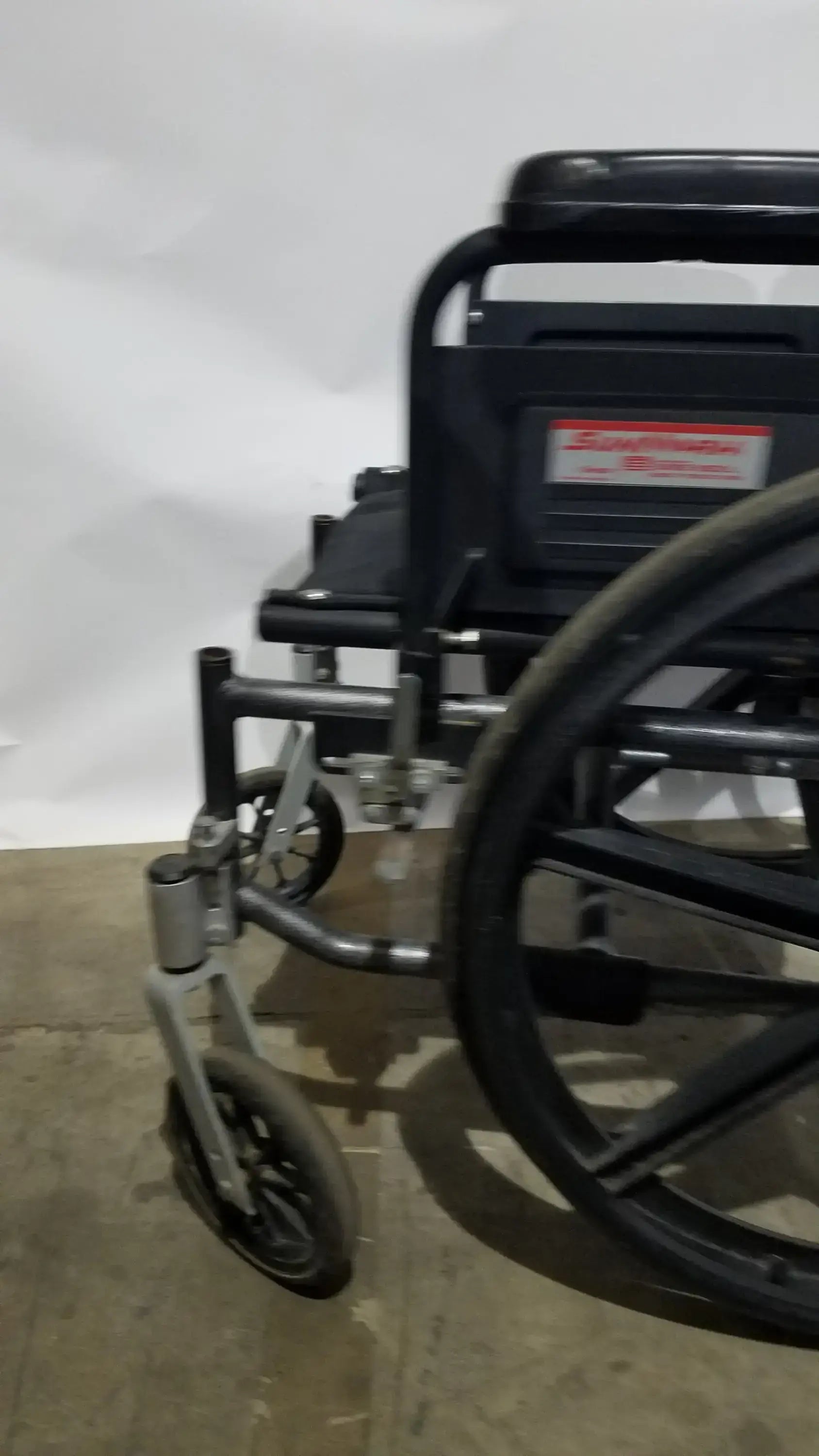Sunmark Folding Manual Wheelchair - Durable Black Padded Comfort Seat