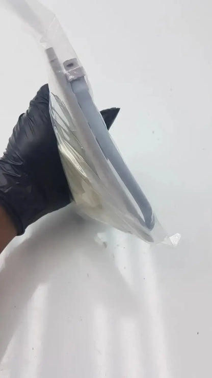 A sleek transparent plastic face shield with gray metallic frame and adjustable ear loops in suntech blood pressure kit