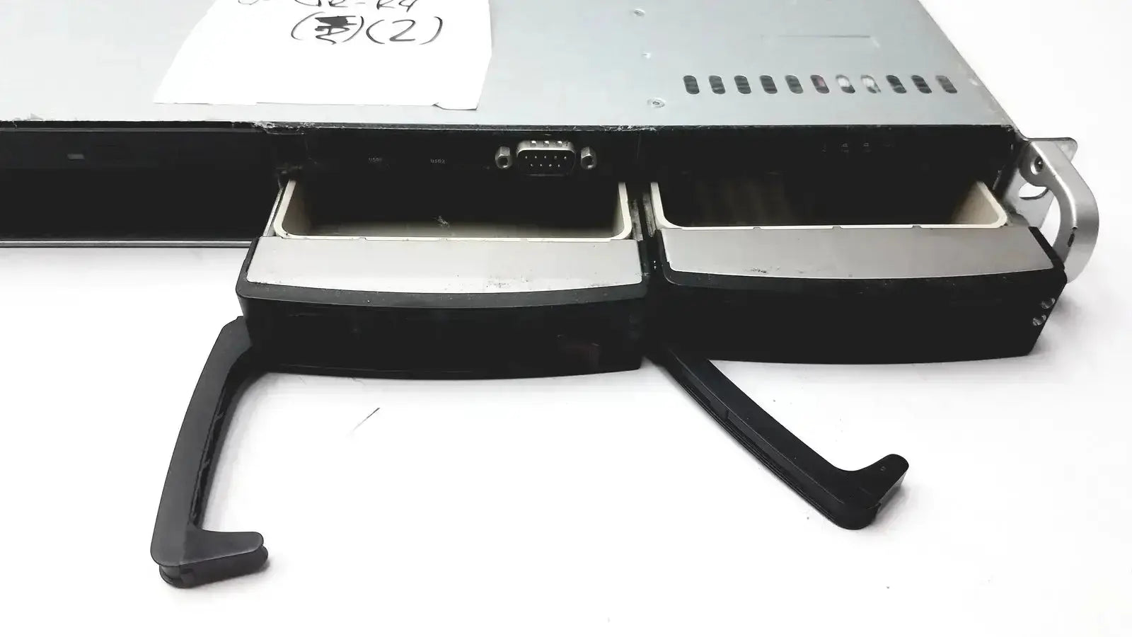 Black and silver supermicro 5015b-mt super server rack with two open drive bays and pull-out handles