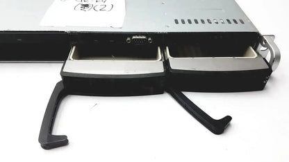 Black and silver supermicro 5015b-mt super server rack with two open drive bays and pull-out handles
