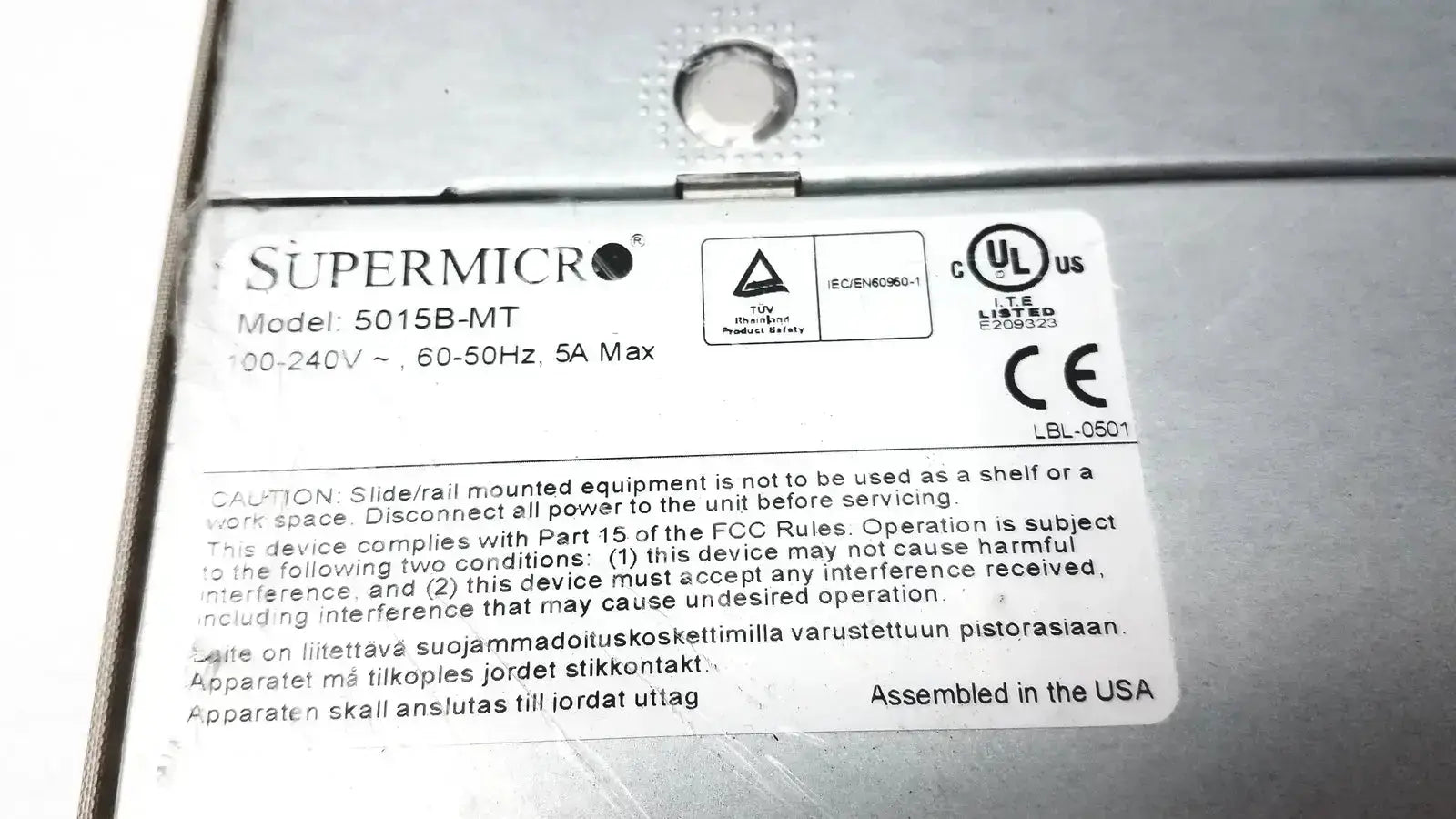 Supermicro 5015b-mt super server motherboard with silver metallic finish and black regulatory compliance label