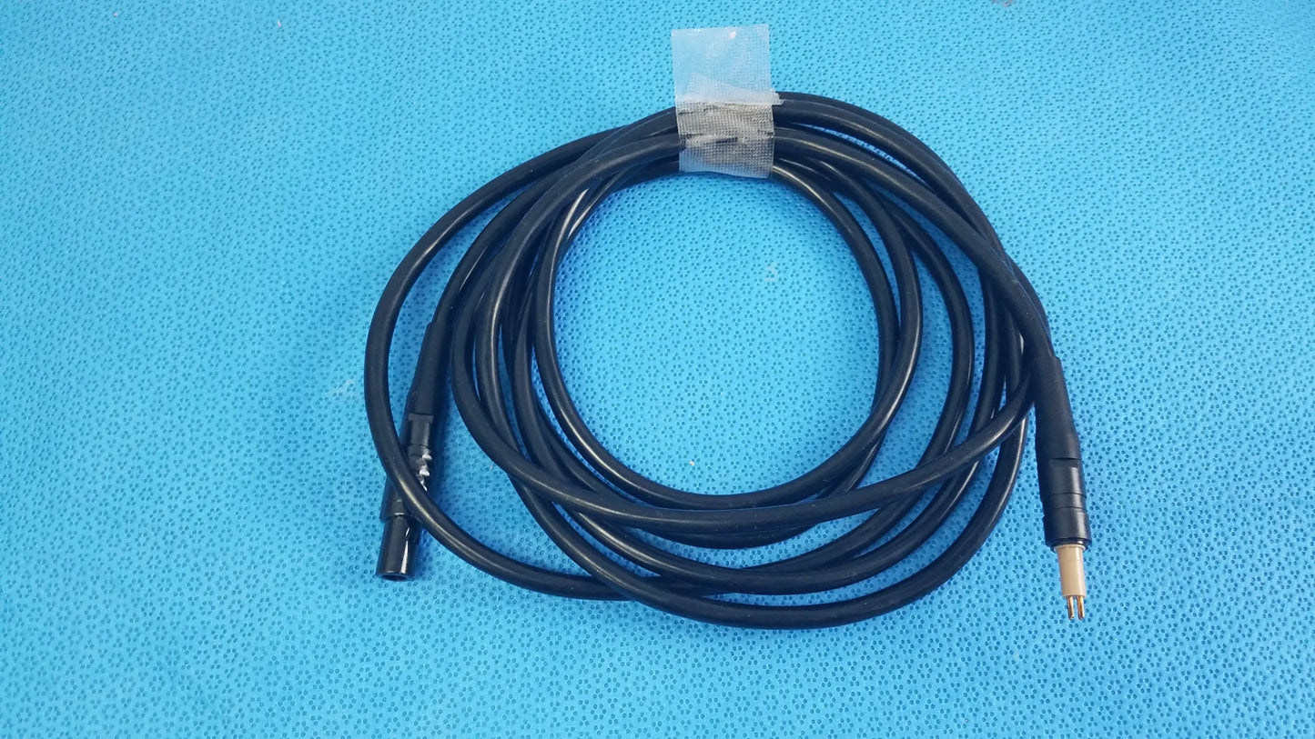 Black coiled surgical scher handpiece cable console connector power cord with black and gold-toned connectors for medical equipment