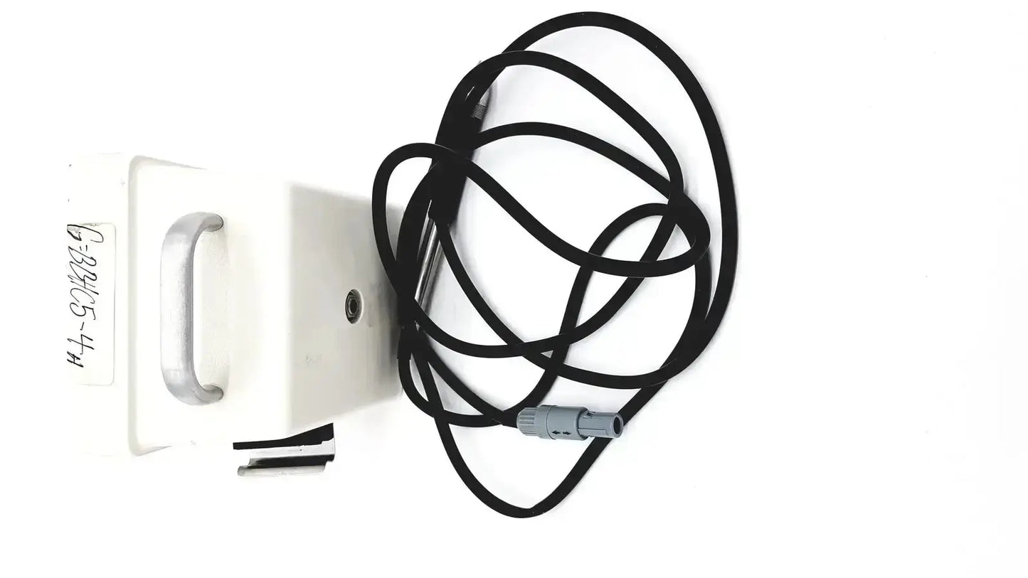 Black coiled cable with gray connector beside white sybron analytic system b dental endo heat source model 1005
