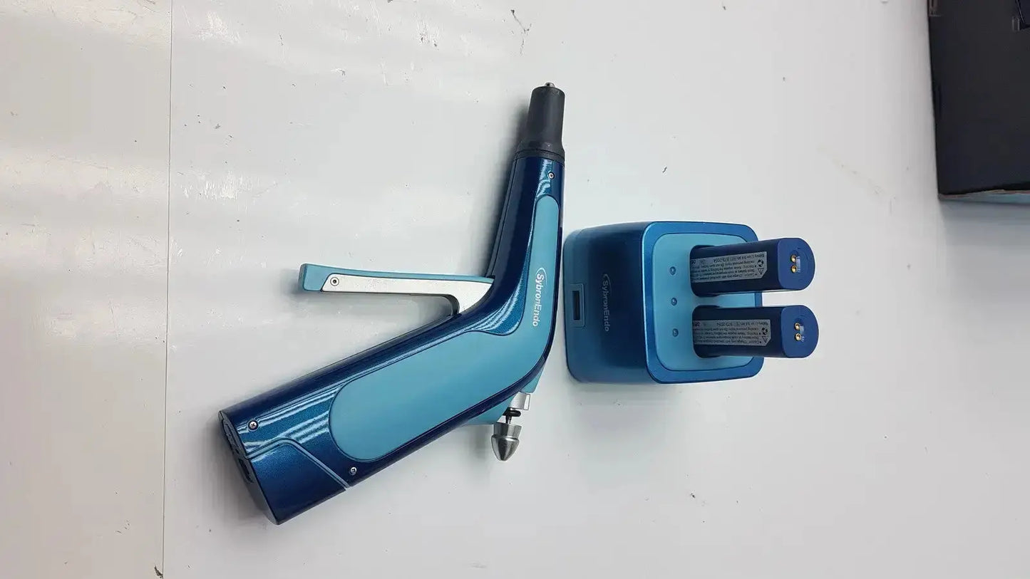Blue and silver cordless obturation dental handpiece with charging station and two batteries by Kerr Endodontic g-cir-r4-30f used medical equipment for sale