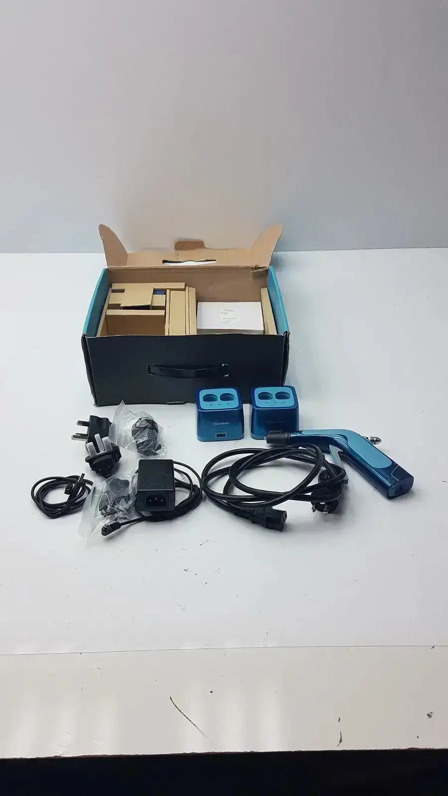 Blue plastic spray nozzle with black cord and power adapter for sybronendo system b cordless obturation device g-cir-r4-30f used medical equipment for sale