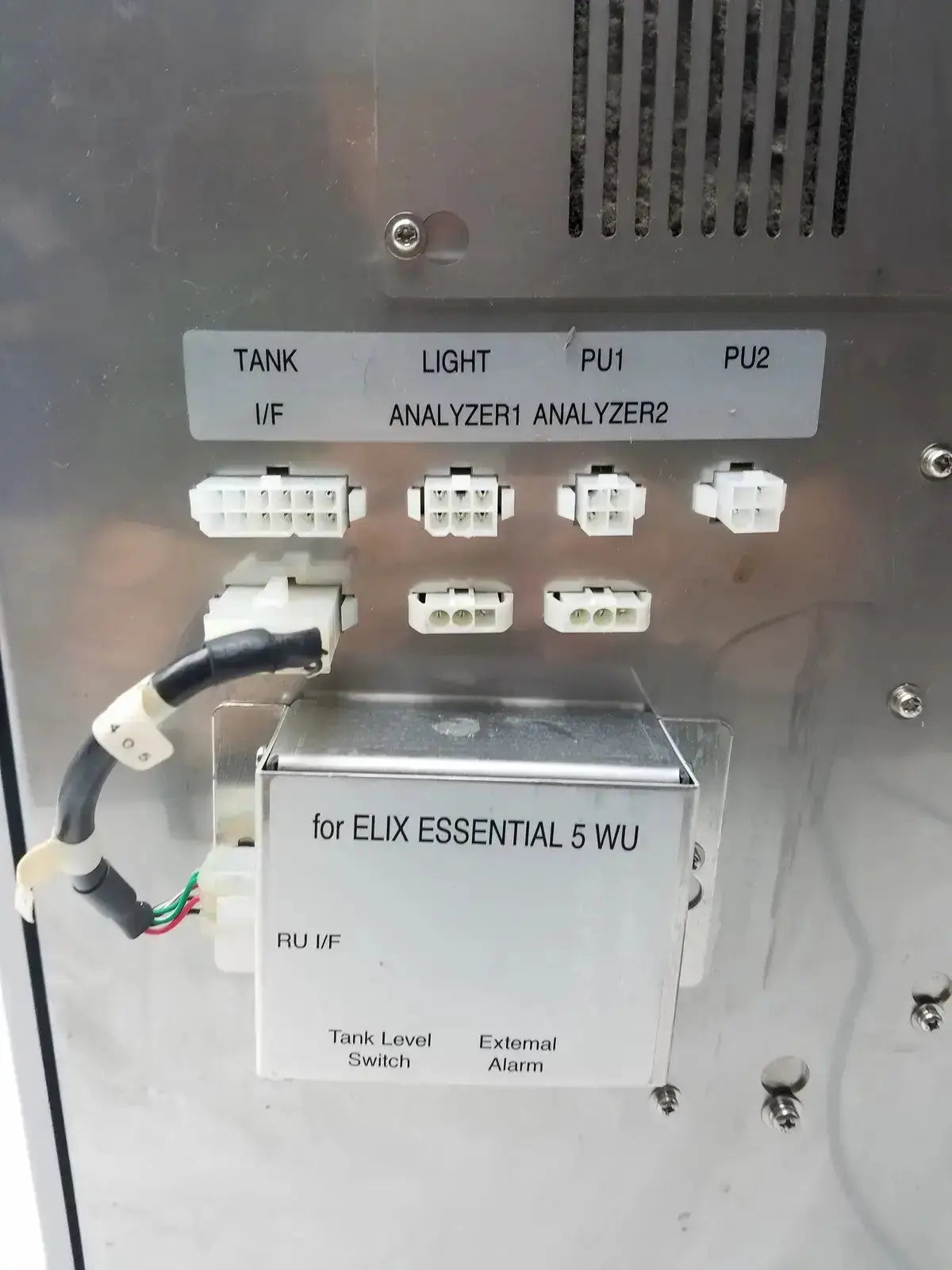 Silver metallic reagent delivery box labeled for elix essential 5 wu with white connectors and black cable for sysmex ru-20 reagent delivery system