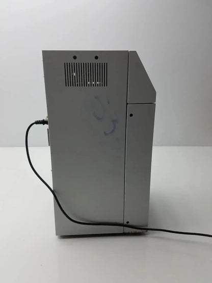 Silver metallic sysmex ru-20 reagent delivery system printer with vertical vent grille and black power cord back side view