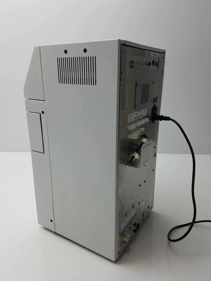 Back view of a silver metallic sysmex ru-20 reagent delivery system with ventilation slats and rear panel ports