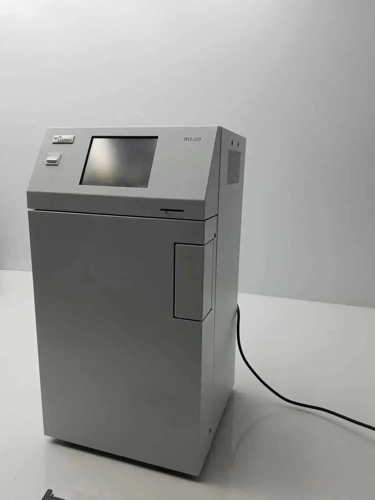Gray metallic sysmex ru-20 reagent delivery system laboratory instrument with touchscreen labeled tcl-20 for reagent delivery