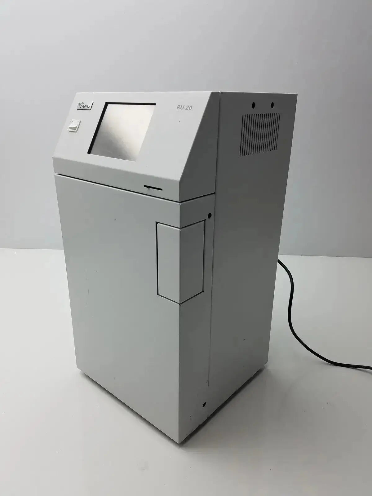 Gray metallic sysmex ru-20 reagent delivery system laboratory instrument with touchscreen display and side ventilation grille