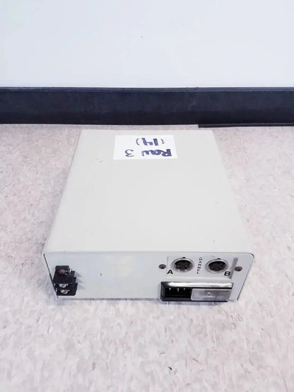 Light gray systec ch-1448 digital tabletop dual zone temperature controller showing two circular ports and side connector