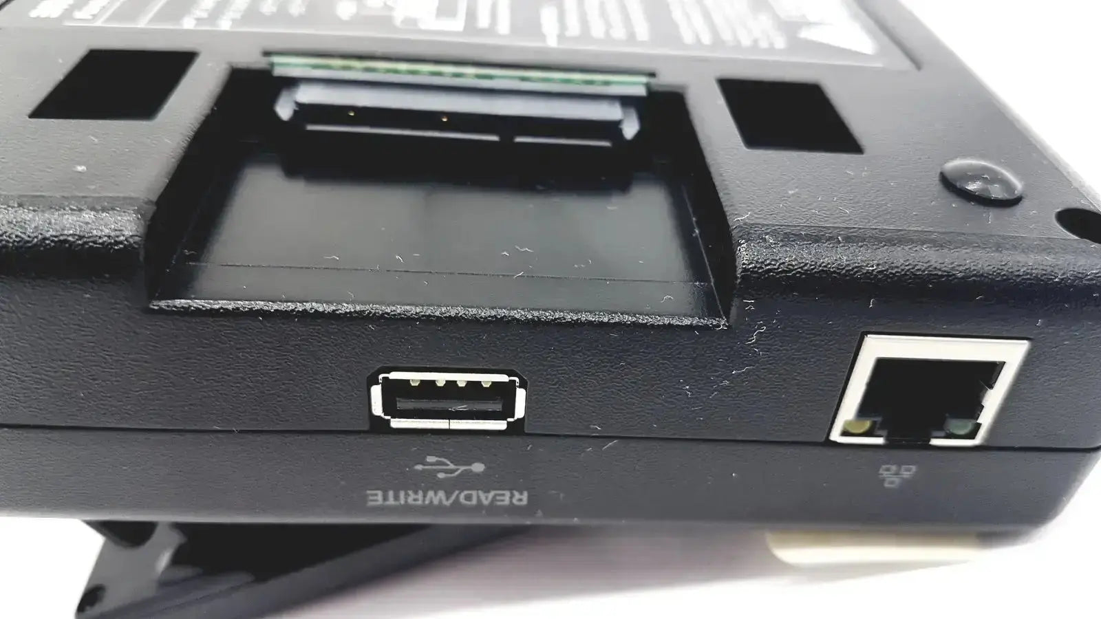 Black plastic tableau td3 forensic imager td3-b back side showing usb read/write and ethernet ports