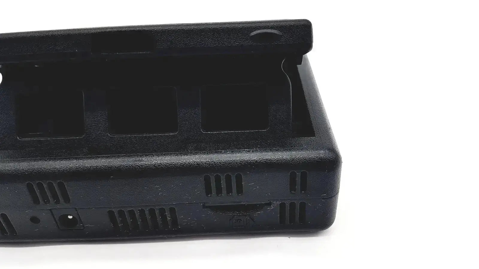 Black plastic tableau td3 forensic imager td3-b battery charger with three slots and ventilation grilles