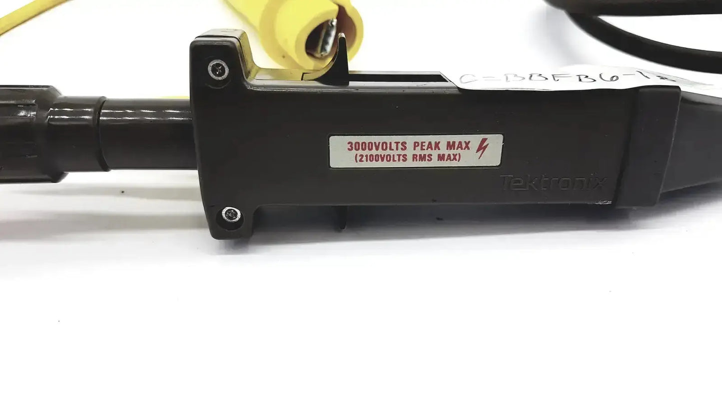 Black plastic industrial power cord connector with yellow cable labeled teco 300 volts peak max voltage rating untested
