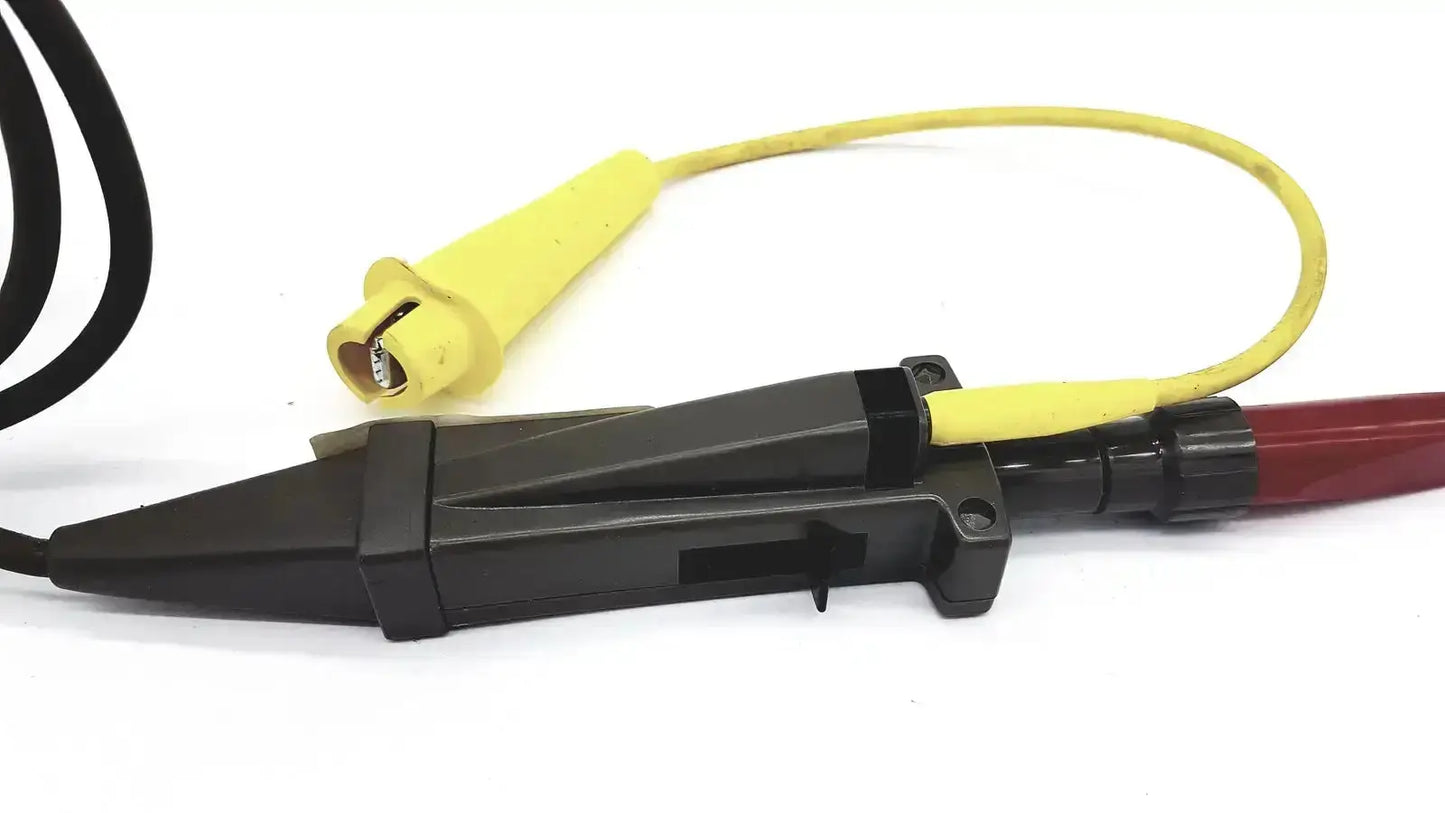 Tektronix insulated test probe with black and red leads and yellow cable connector rated for 3000 volts peak max and 2100 volts rms max untested