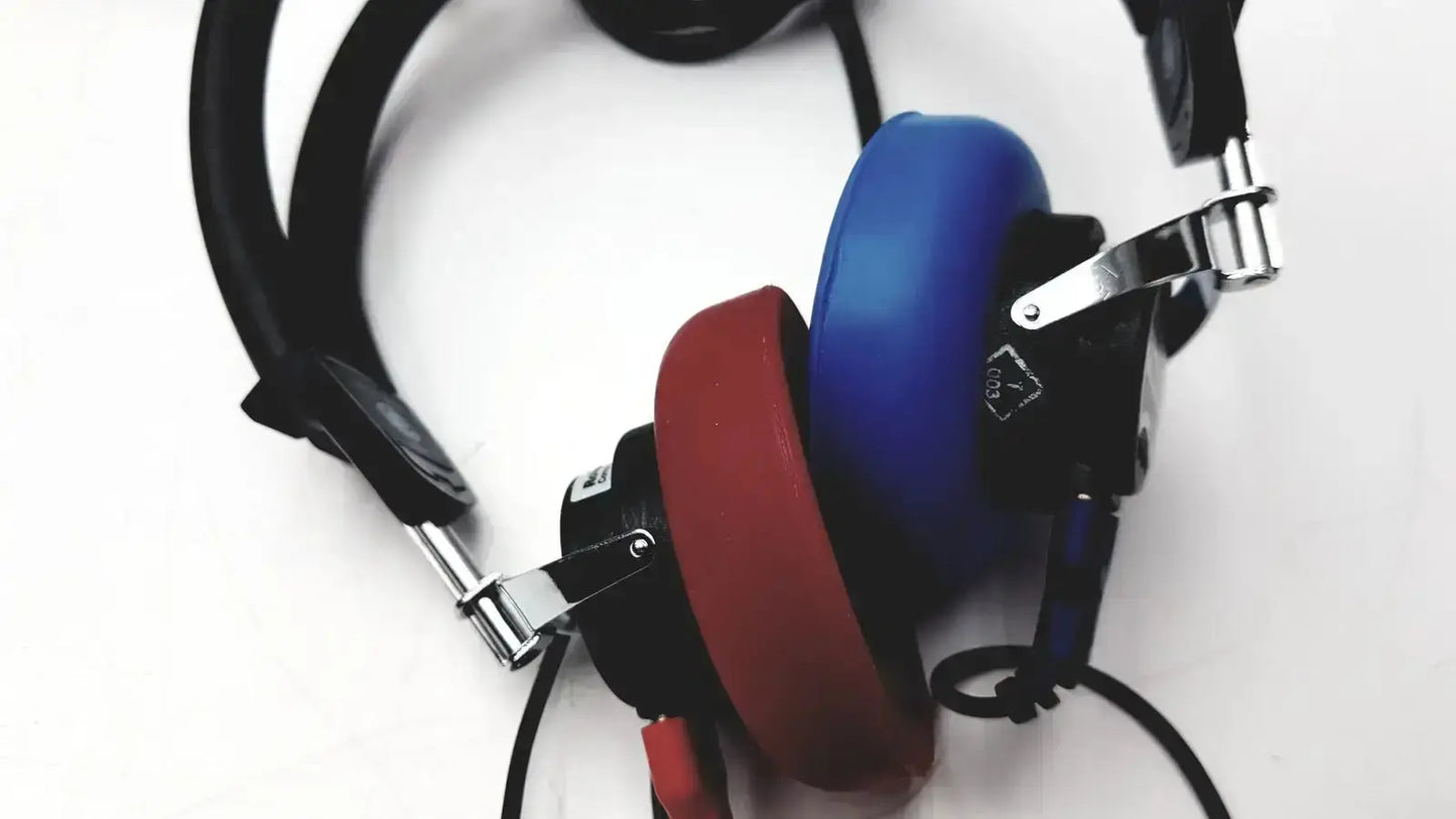 Over-ear telephonics tdh-39p audiometric earphones with vibrant blue and red padded earcups and black adjustable headband