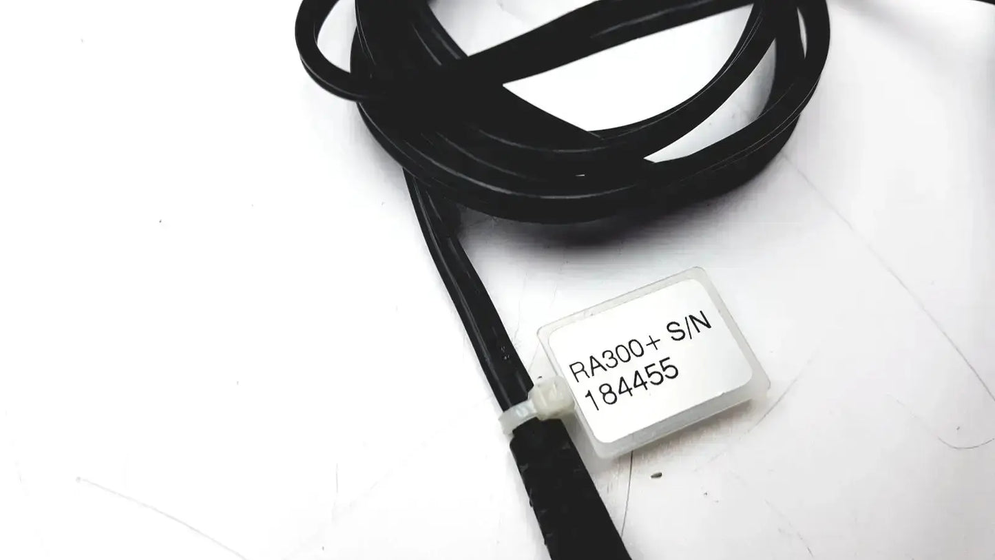 Black coiled cable with white label ra300+s/n 184455 for telephonics tdh-39p audiometric earphones model td-h39p