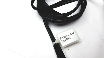 Black coiled cable with white label ra300+s/n 184455 for telephonics tdh-39p audiometric earphones model td-h39p