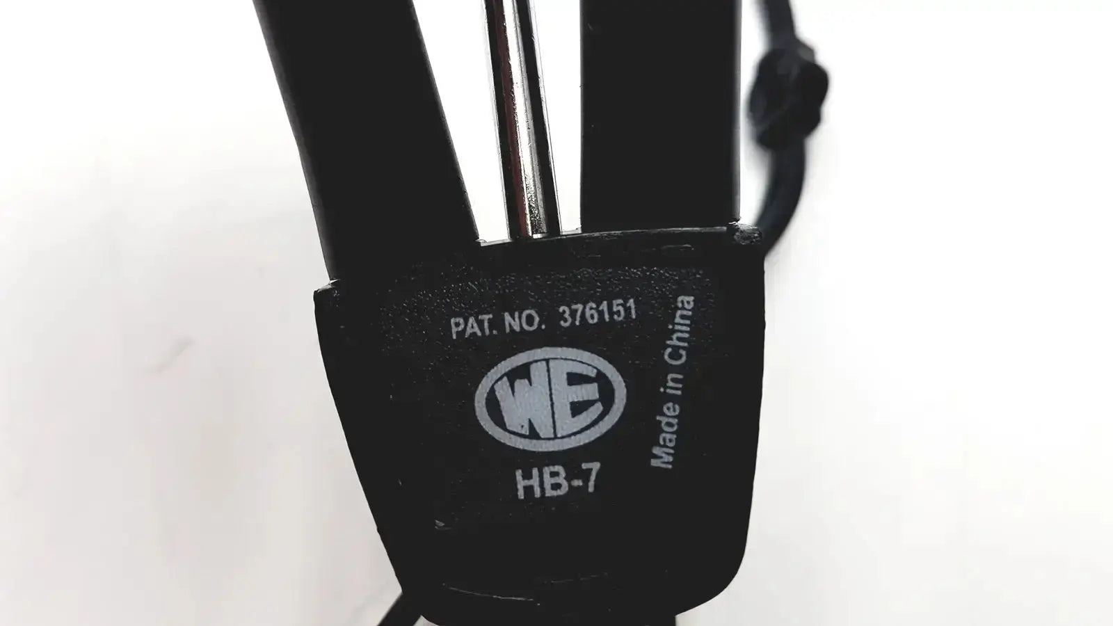 Black plastic headband with silver metal clasp and we logo for telephonics tdh-39p audiometric earphones model hb-7