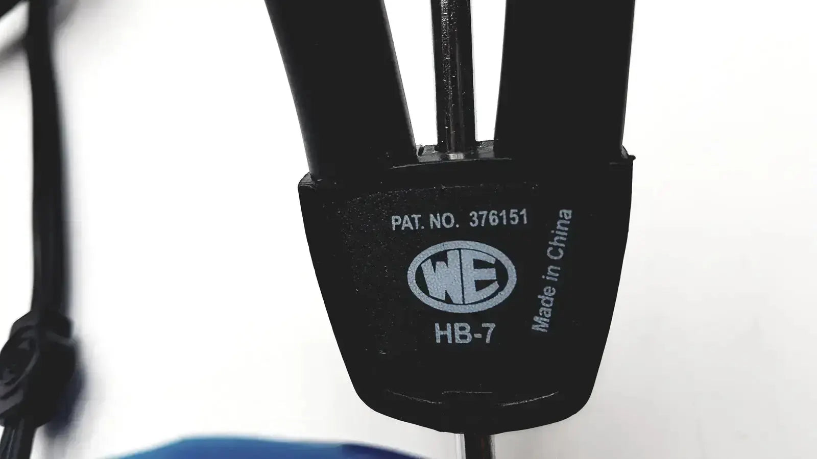 Black plastic-handled wire cutter with silver we logo hb-7 used alongside telephonics tdh-39p audiometric earphones