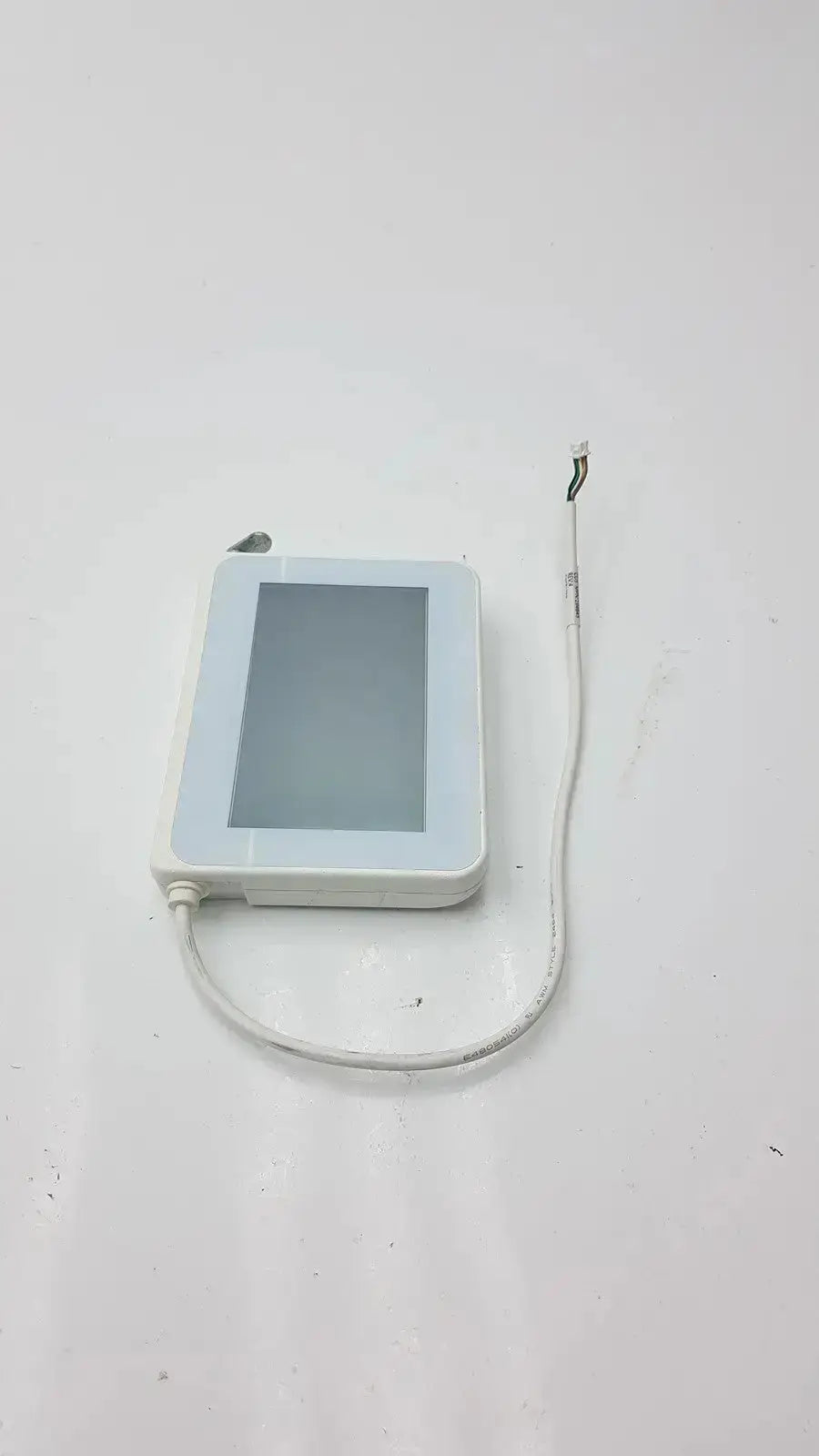 White rectangular tft hmi lcd nextion device with thin cable and mounting frame for industrial touch control applications