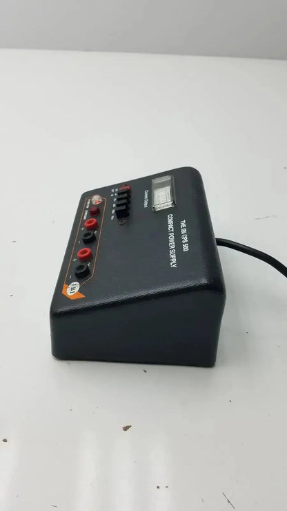 Black plastic ibi cps 500 compact power supply model 92100 with red and black terminals and digital display controls