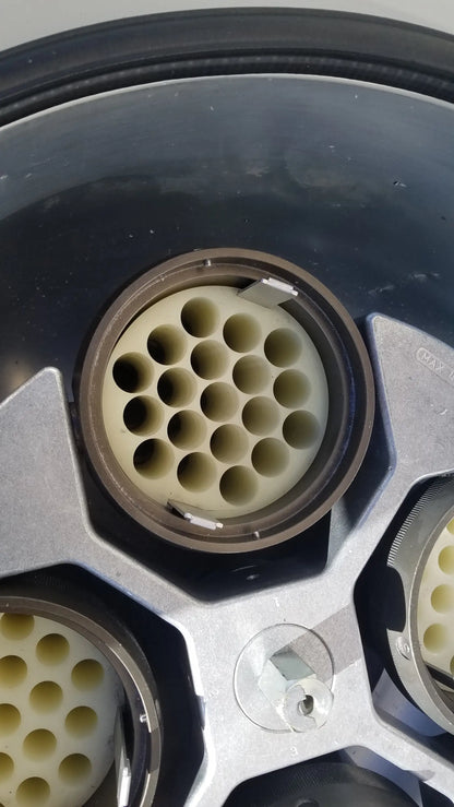 Beige plastic connector with 24 port array in metallic housing for silent solution silencer 2310 centrifuge medical equipment