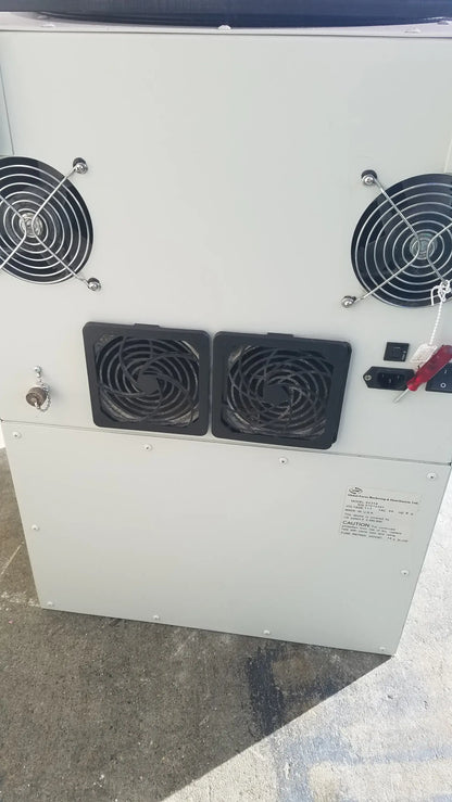 White industrial-grade server rack with four black fans and power panel at back of silent solution silencer 2310 centrifuge system