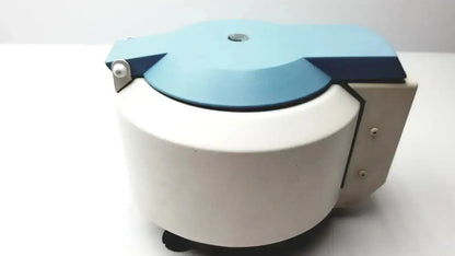 White and light blue Thermo Electron Corporation iec centra cl2 centrifuge with rounded lid and side-mounted control panel