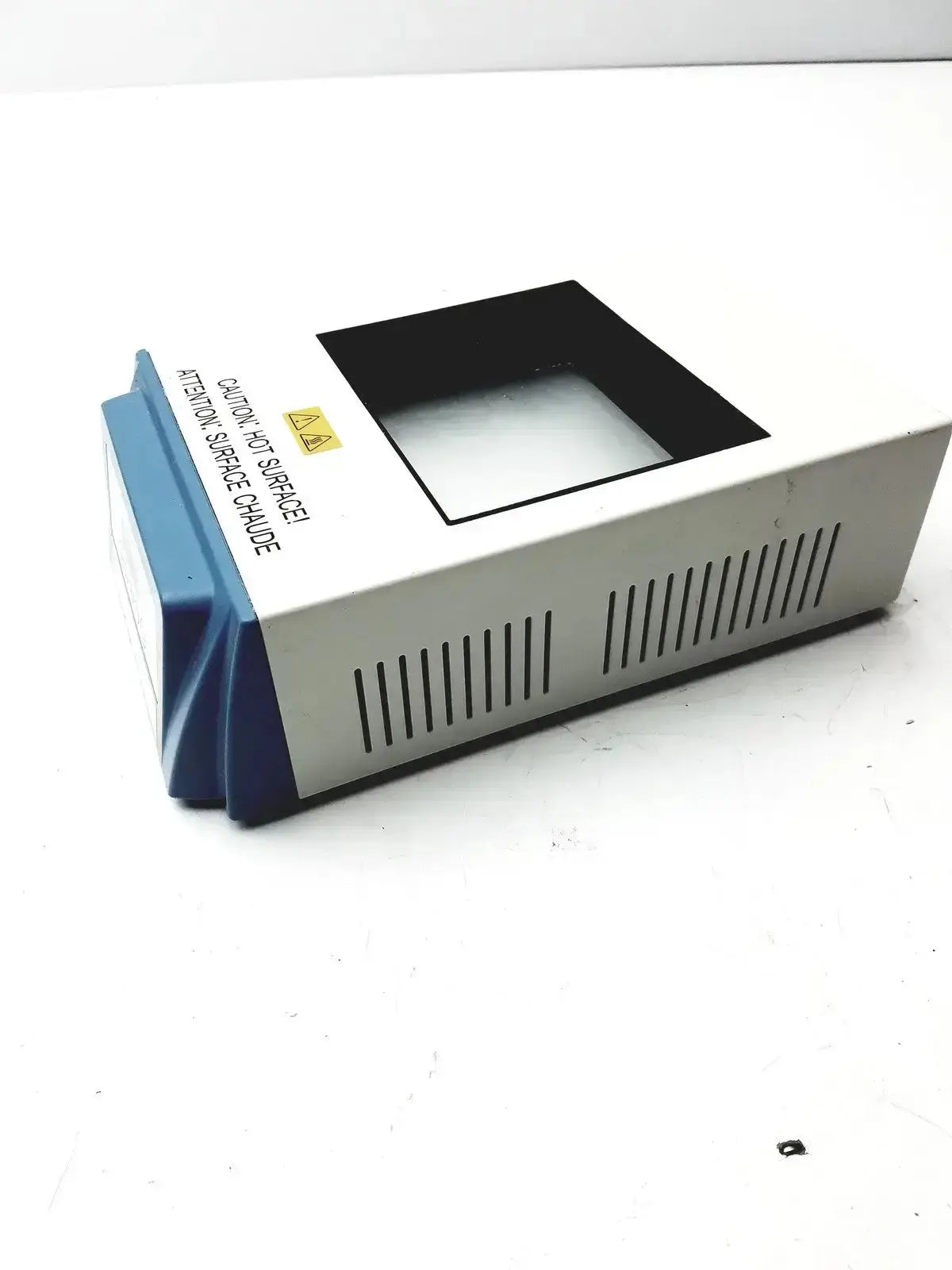 Thermo Scientific digital dry block heater in white and blue with a black square viewing window on top for lab use