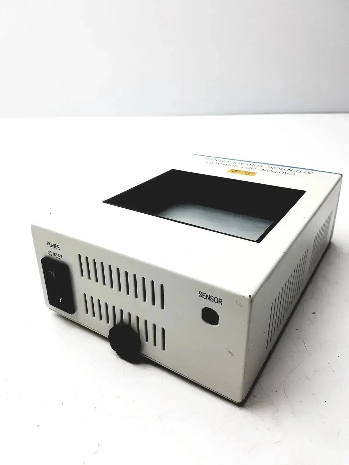 Back view of thermo scientific digital white dry bath block heater with black power inlet and side ventilation slits