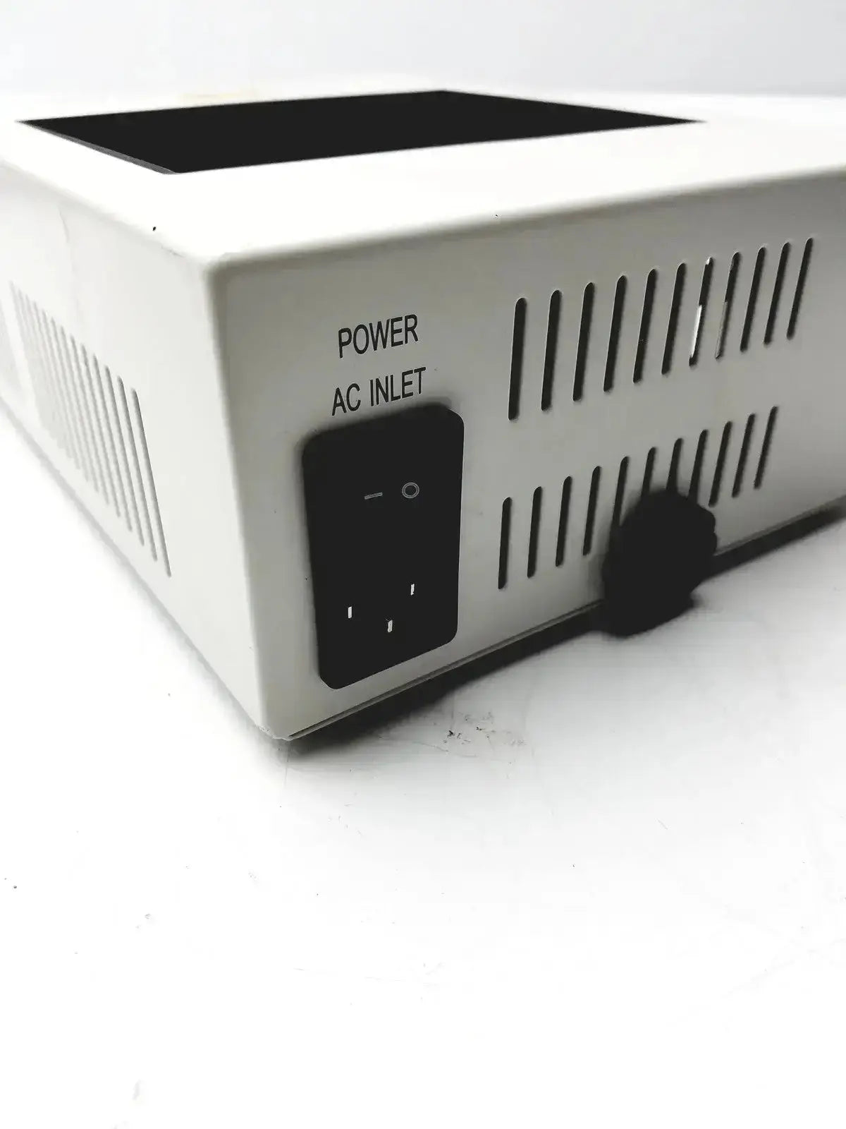 White rectangular power supply unit with black ac inlet and ventilation slits for thermo scientific digital dry block heater