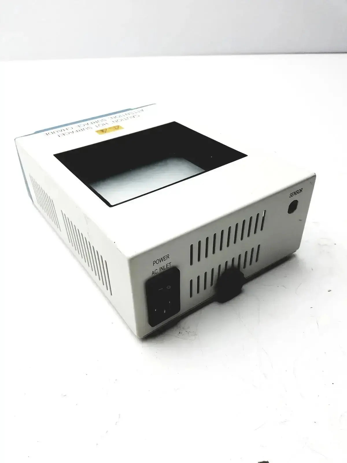 White rectangular thermo scientific digital dry block heater with black front panel and labeled power inlet and sensor ports