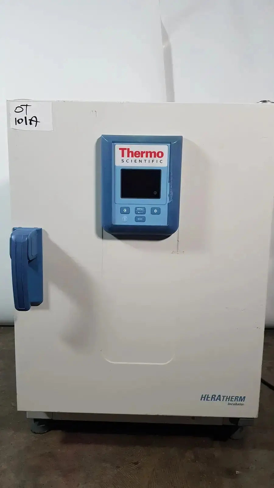 White thermo scientific heratherm igs60 incubator with blue control panel and handle for precise laboratory use